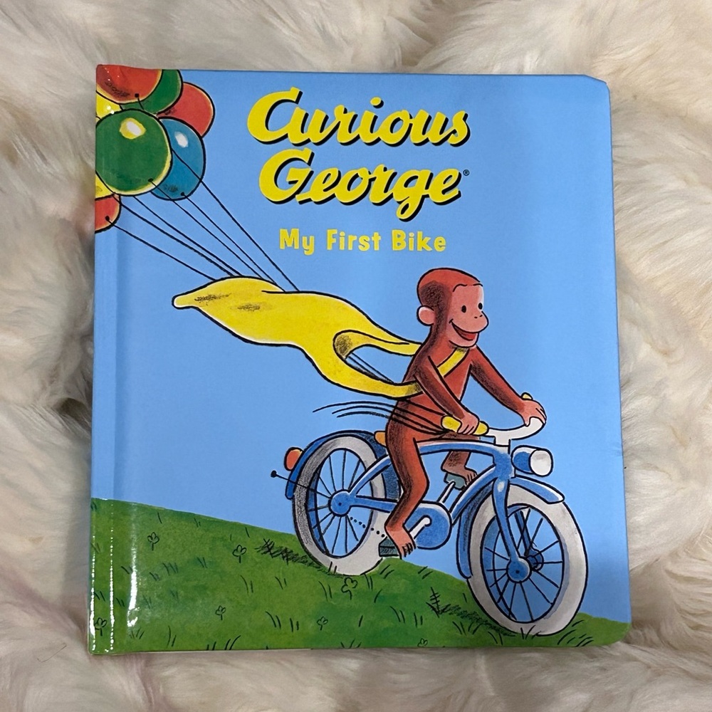Curious George My First Bike (padded board book)  by H. A. Rey Hardcover